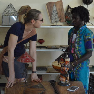 Afrikanischer Topfuntersetzer Unikat aus Holz im Masken-Design - handgemacht